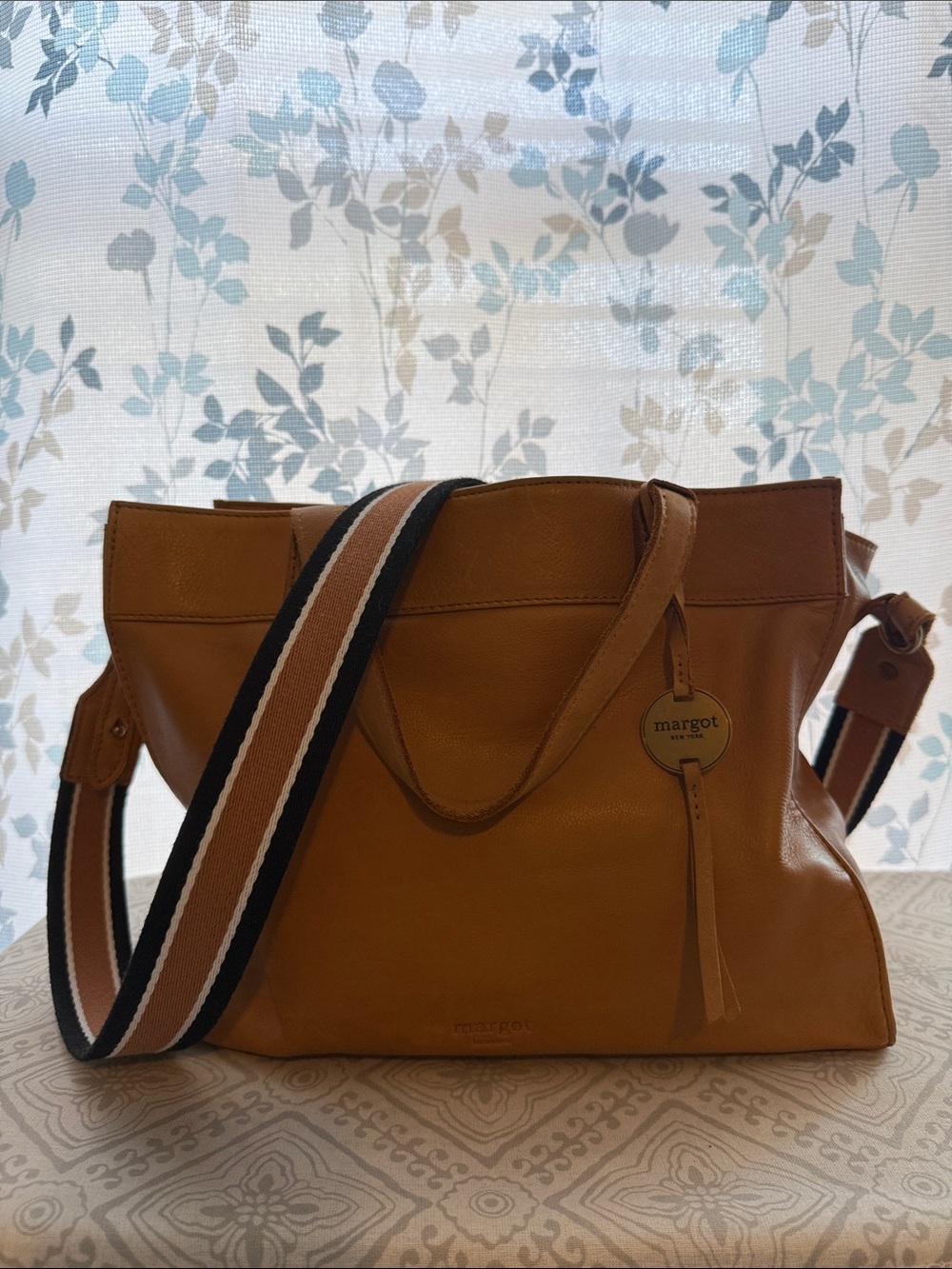 margot cognac leather shoulder tote with striped webbing strap